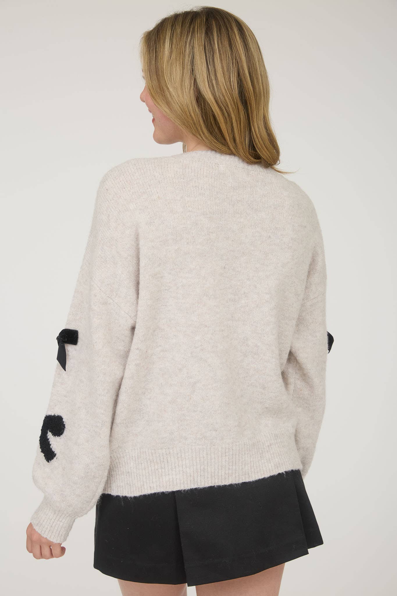 BOW PATTERN LONG SLEEVE KNIT SWEATER