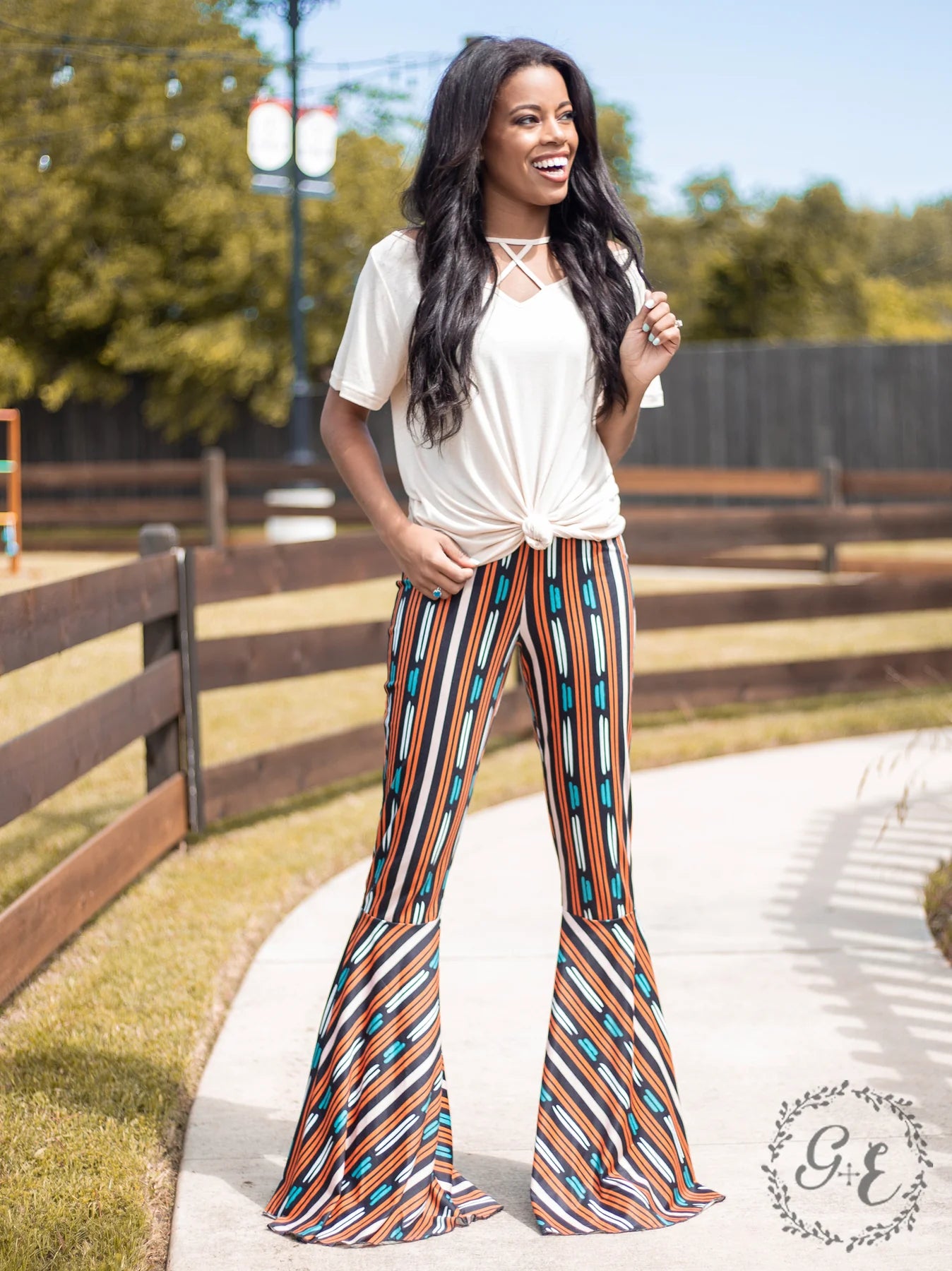 ON THE DANCE FLOOR STRIPE FLARE PANTS, BLACK