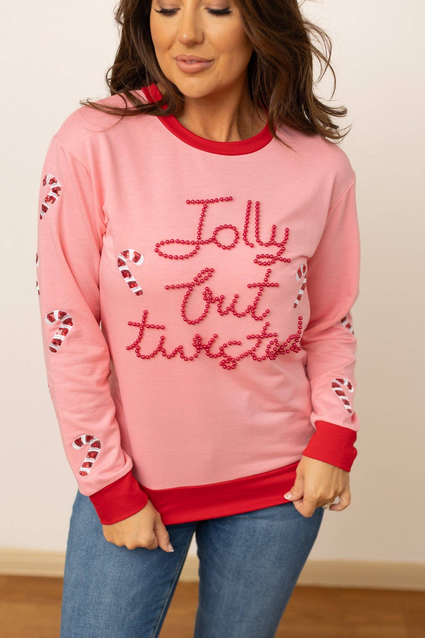 Jolly but Twisted Pink Sweater