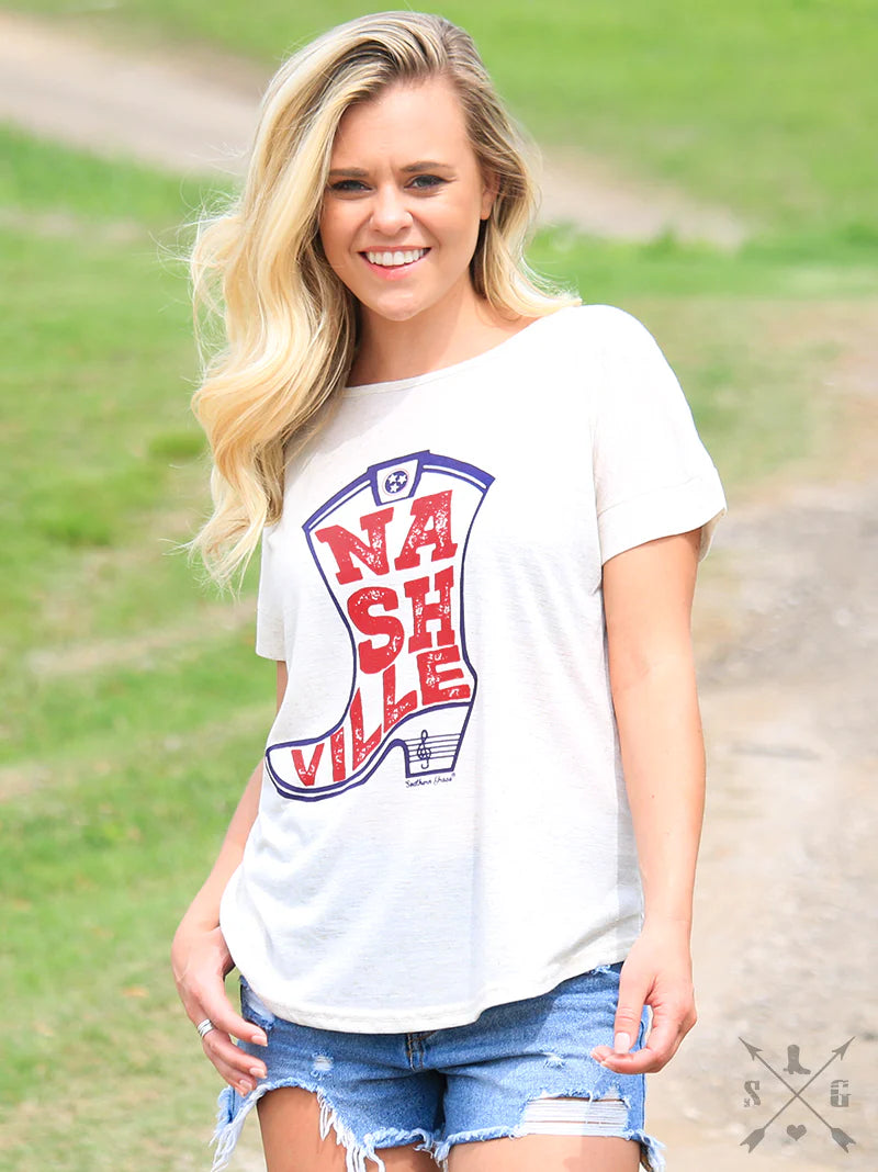 NASHVILLE BOOT ON HEATHERED BEIGE TEE WITH BOW BACK DETAIL