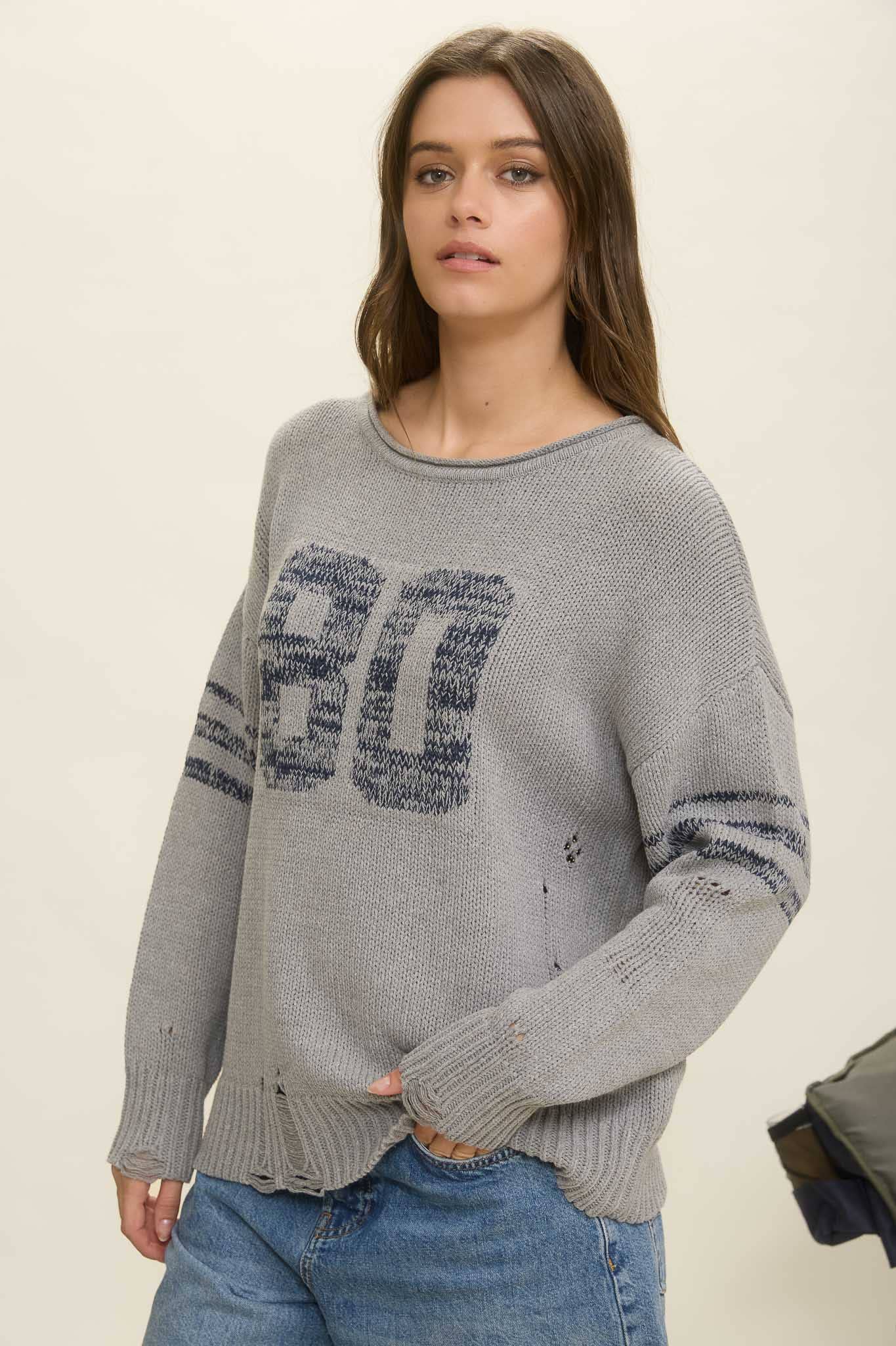 DISTRESSED LONG SLEEVE VARSITY KNIT TOP