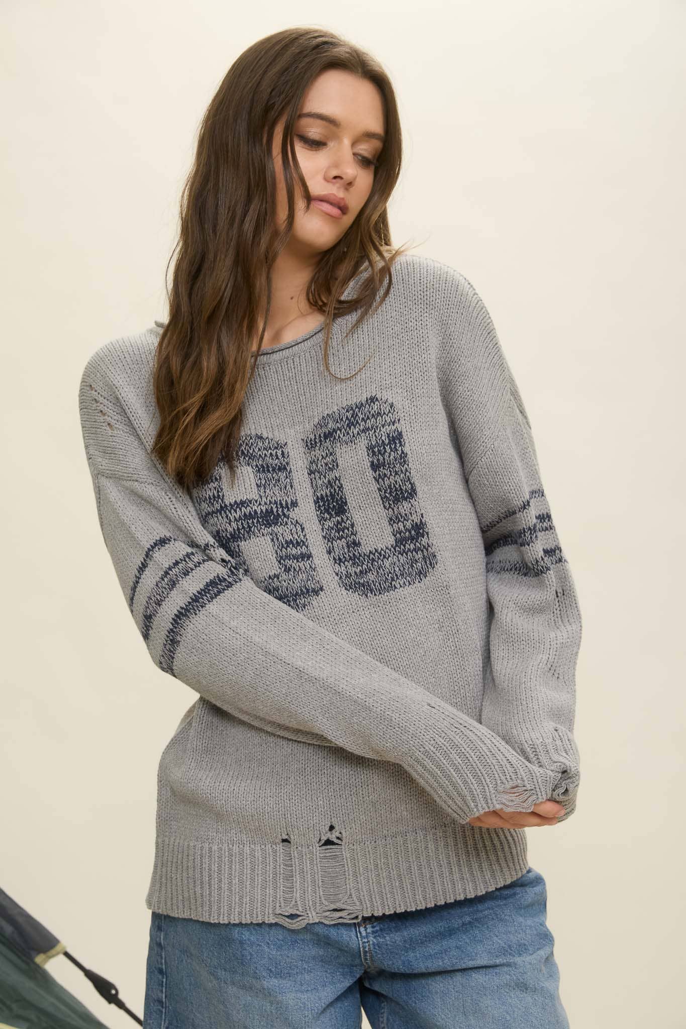 DISTRESSED LONG SLEEVE VARSITY KNIT TOP